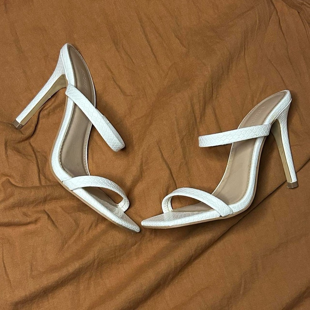White snakeskin print heels